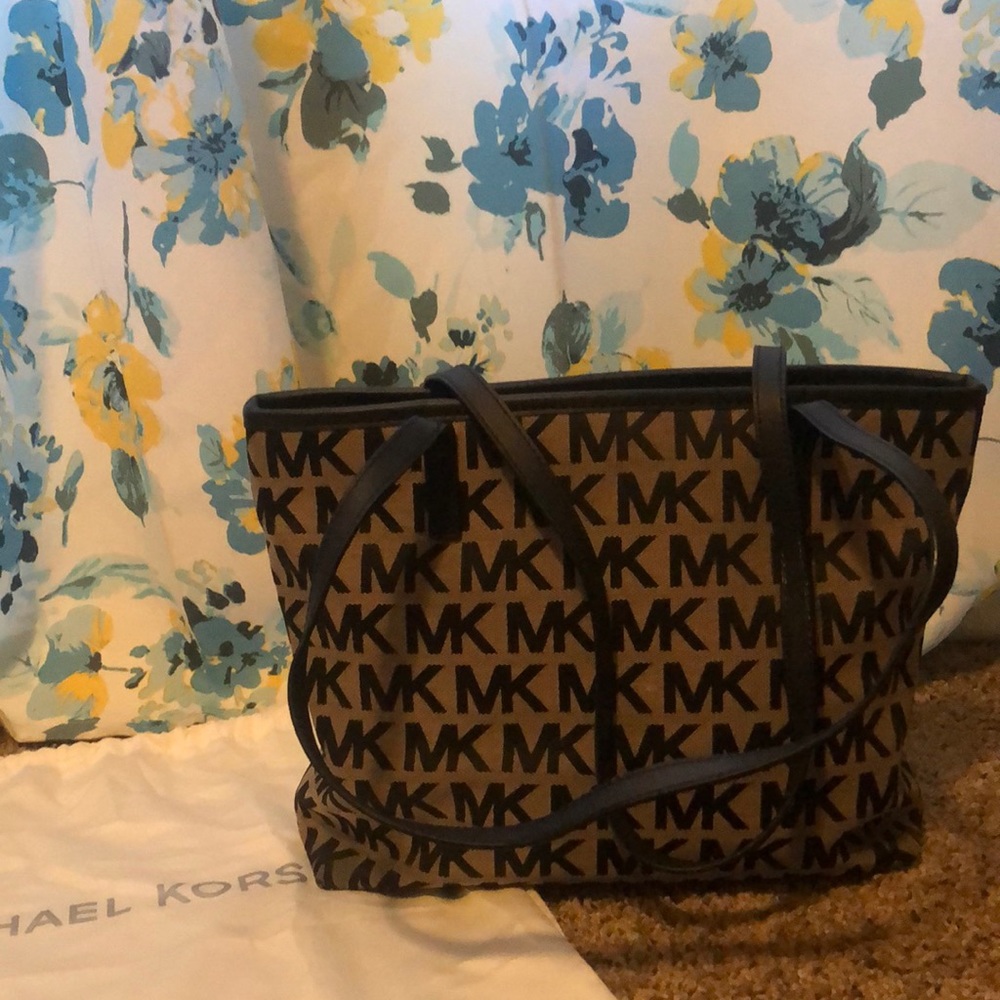 Brown and black Micheal Kors bag